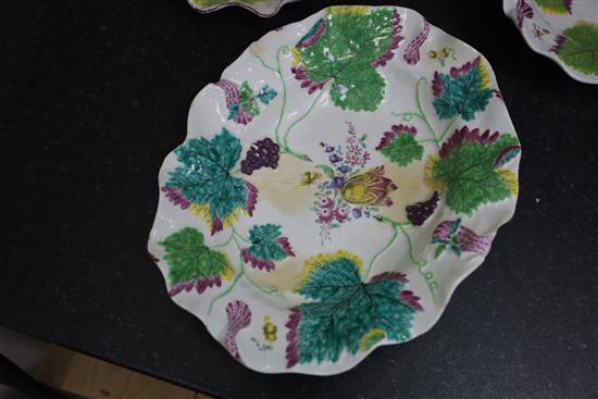 A pair of Chelsea botanical vine leaf dishes, c.1755 and a a pair of similar Bow dishes, c.1758, W. 21.5cm and 26cm, one Bow dish repai